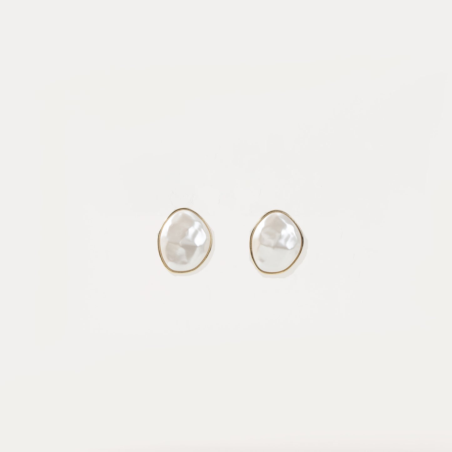 Gold-framed baroque pearl stud earrings