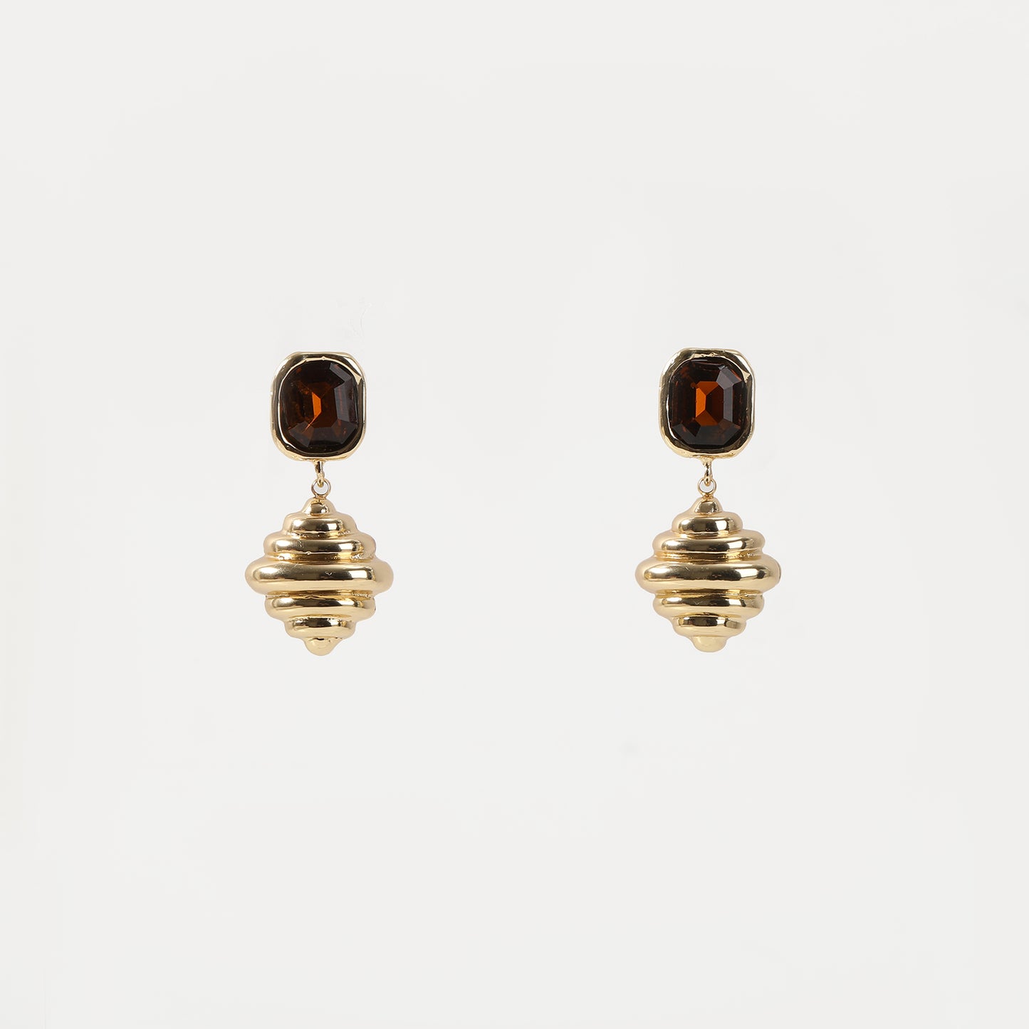 Gold drop earring with brown crystal top and ribbed spiral charm