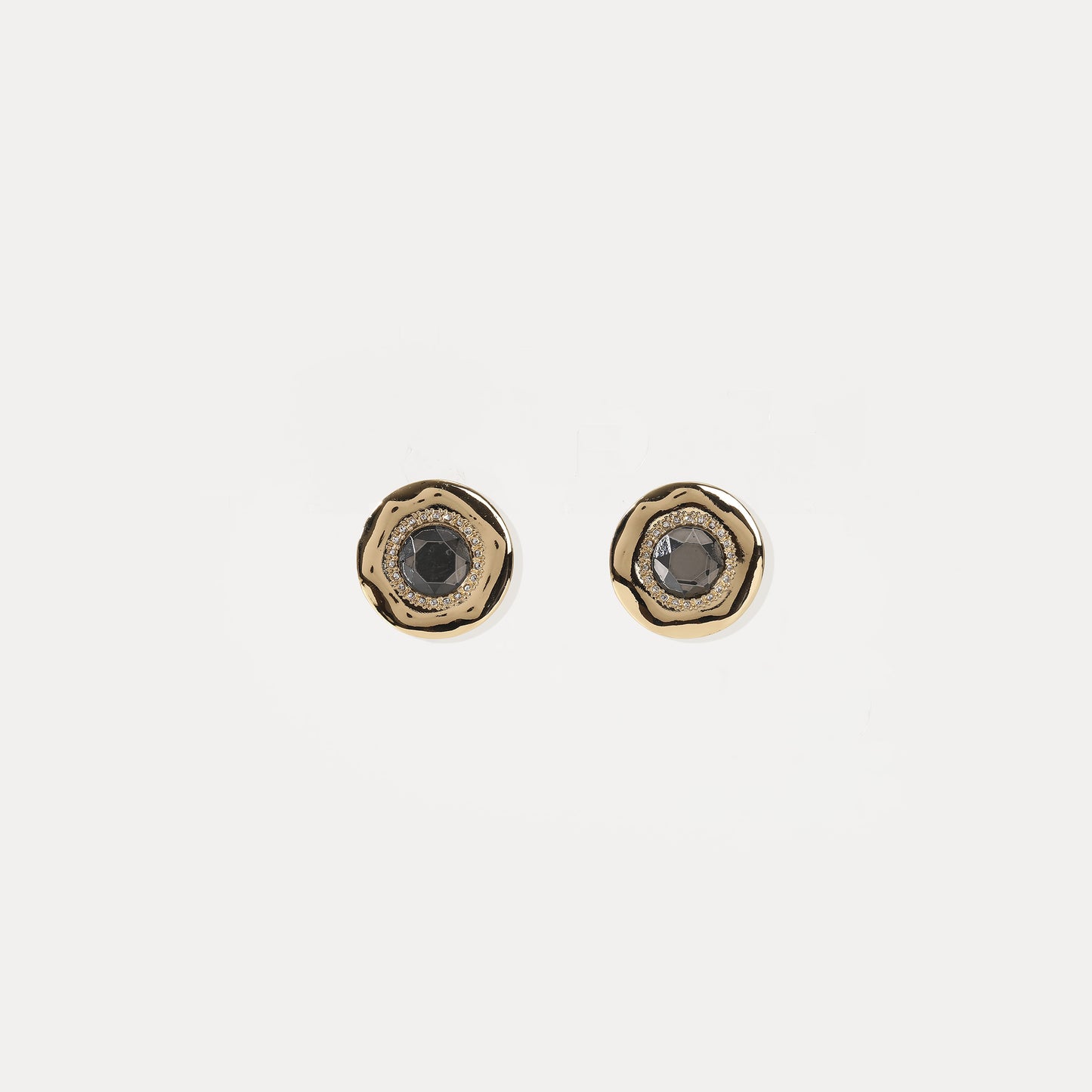 Gold hammered stud earring with central black crystal and diamond halo