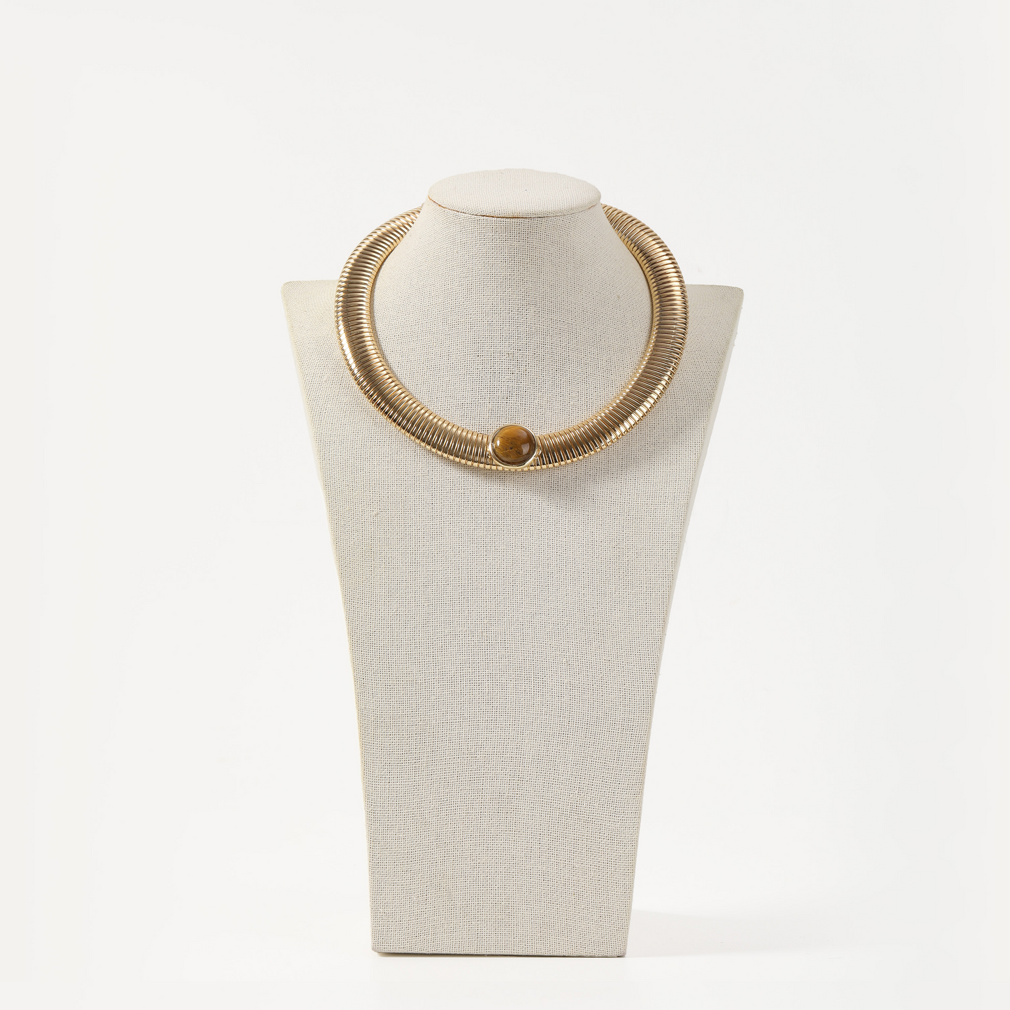 Gold ribbed torque necklace with tiger eye stone