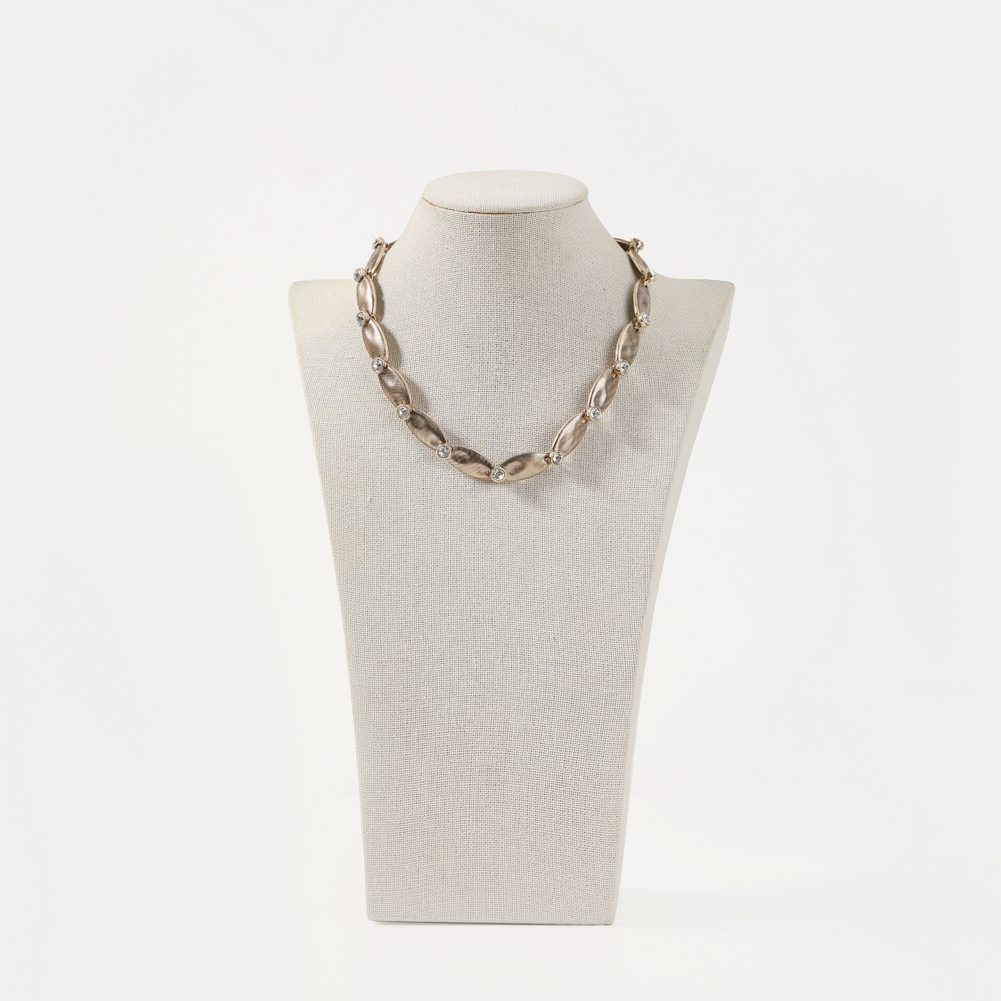 Gold textured oval link crystal necklace