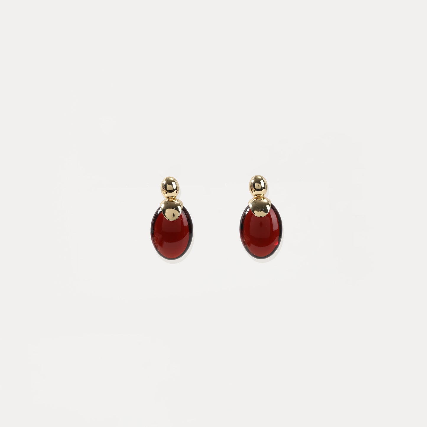 Gold with red amber oval stud earrings