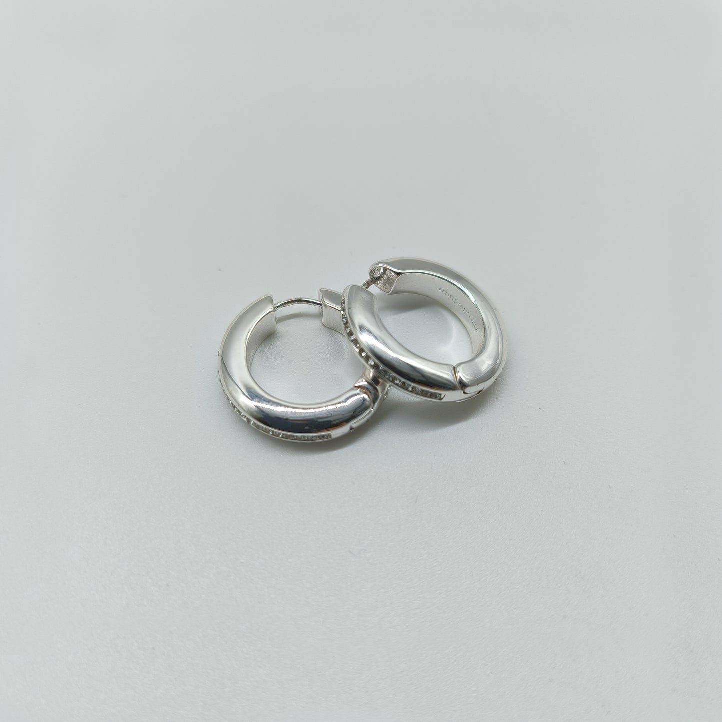 Polished Silver Hoop Earrings with Cubic Zirconia Sparkle