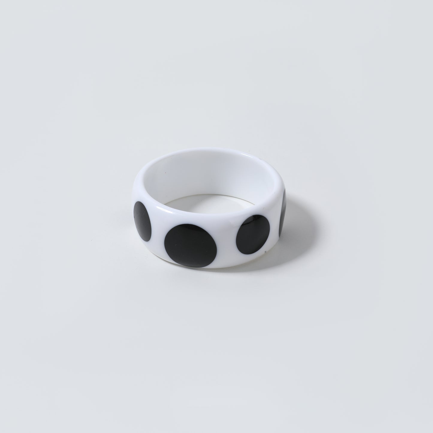 White Glossy Resin Bangle Bracelet with Black Polka Dot Inlay
