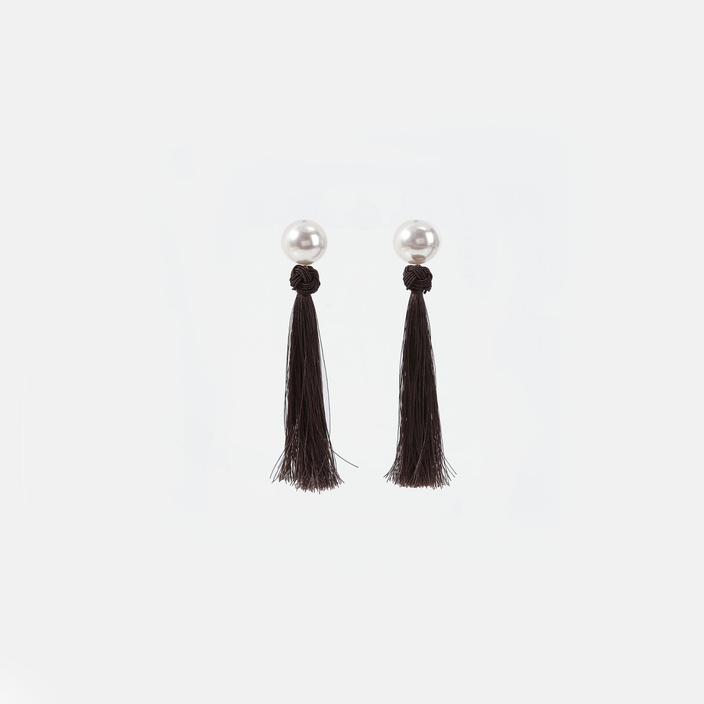 White pearl with dark brown knotted tassel drop earrings