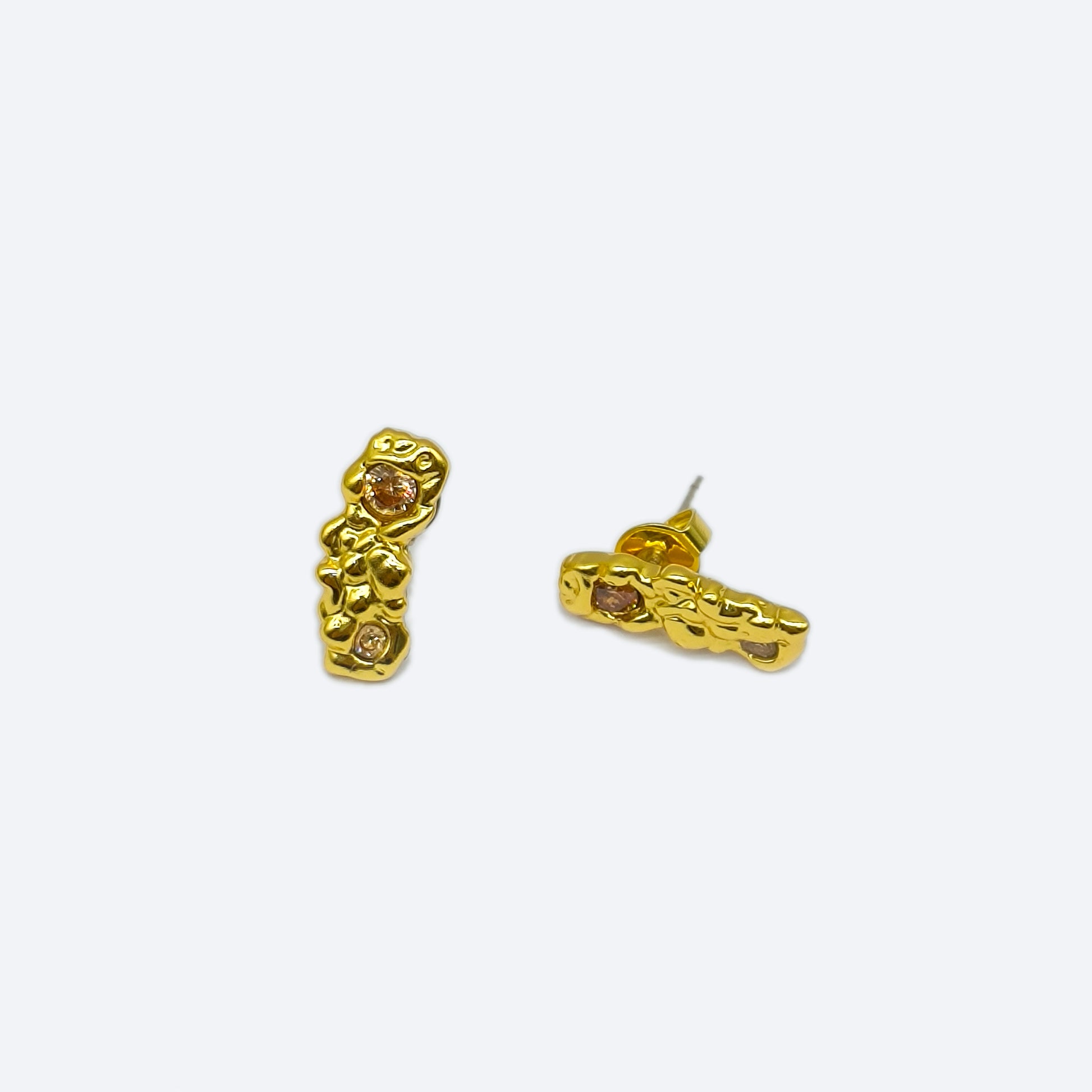 Gold plated textured stud earring with cubic zircon