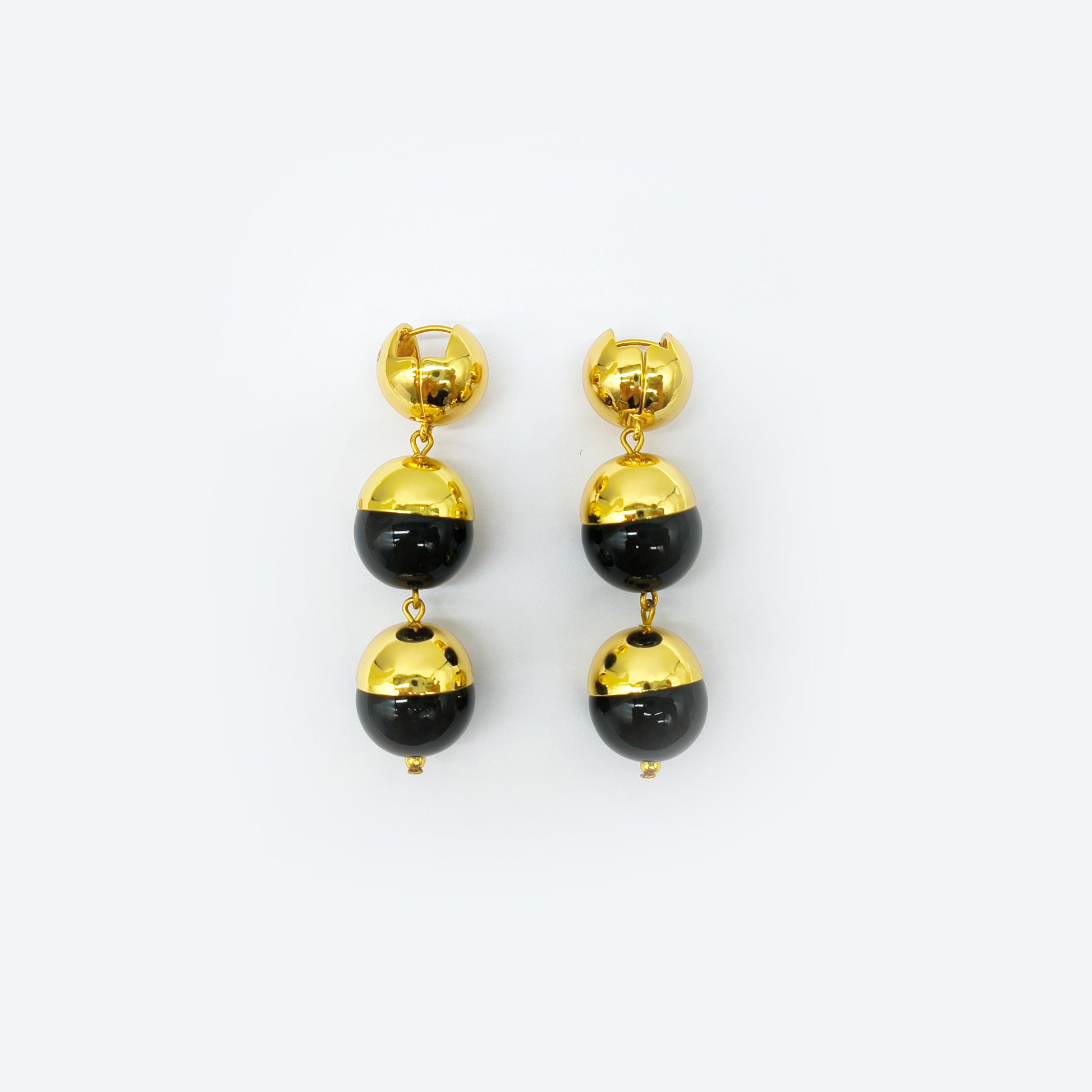 Gold plated hoop dangle earrings with gold half dome and black ball