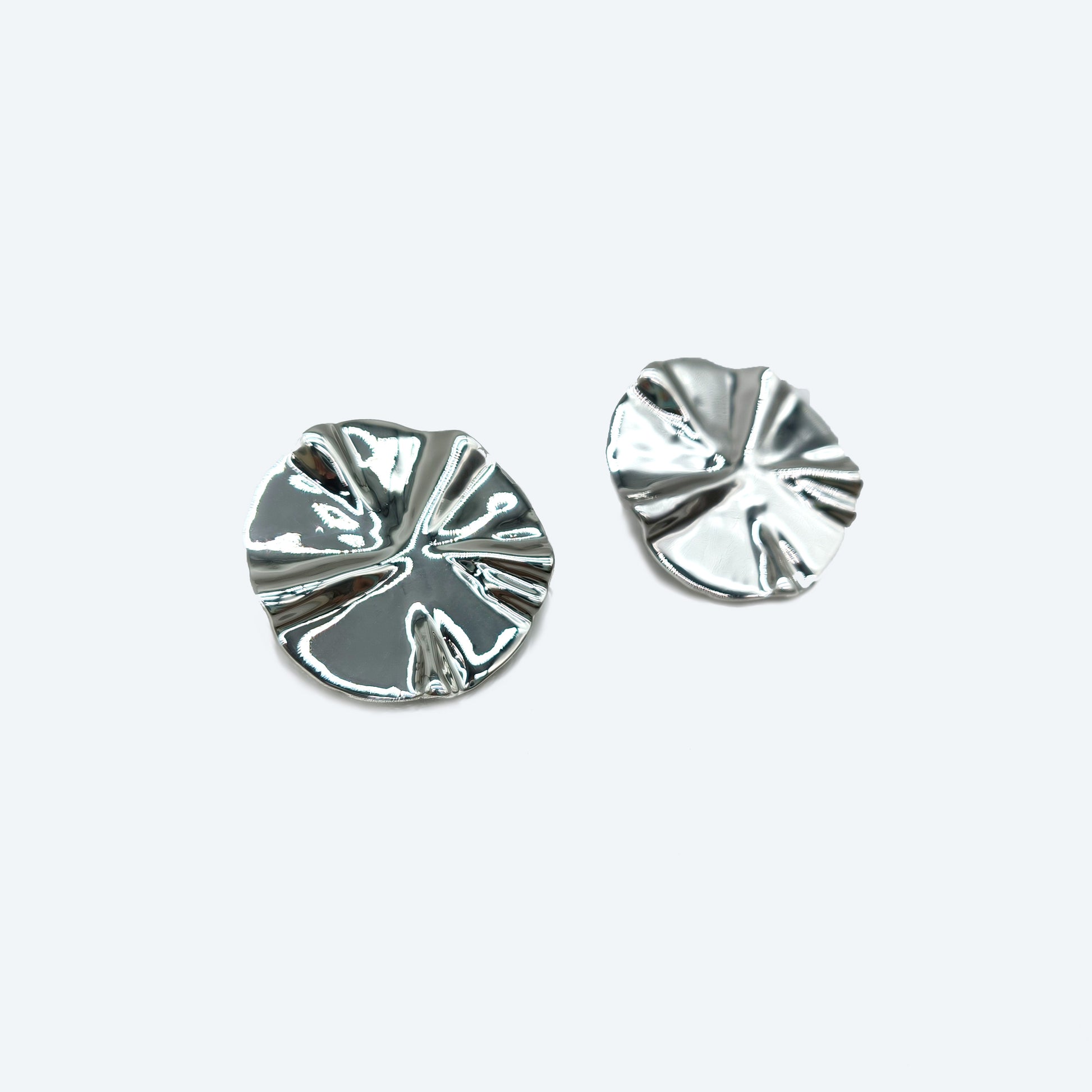 Silver plated earring with textured piece detail