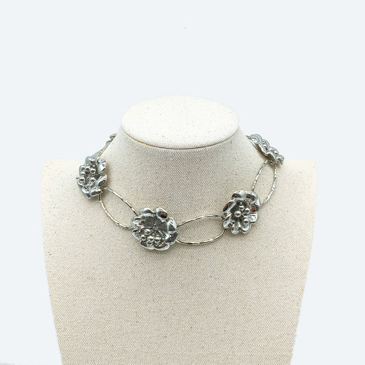 Rhodium plated metal flower necklace