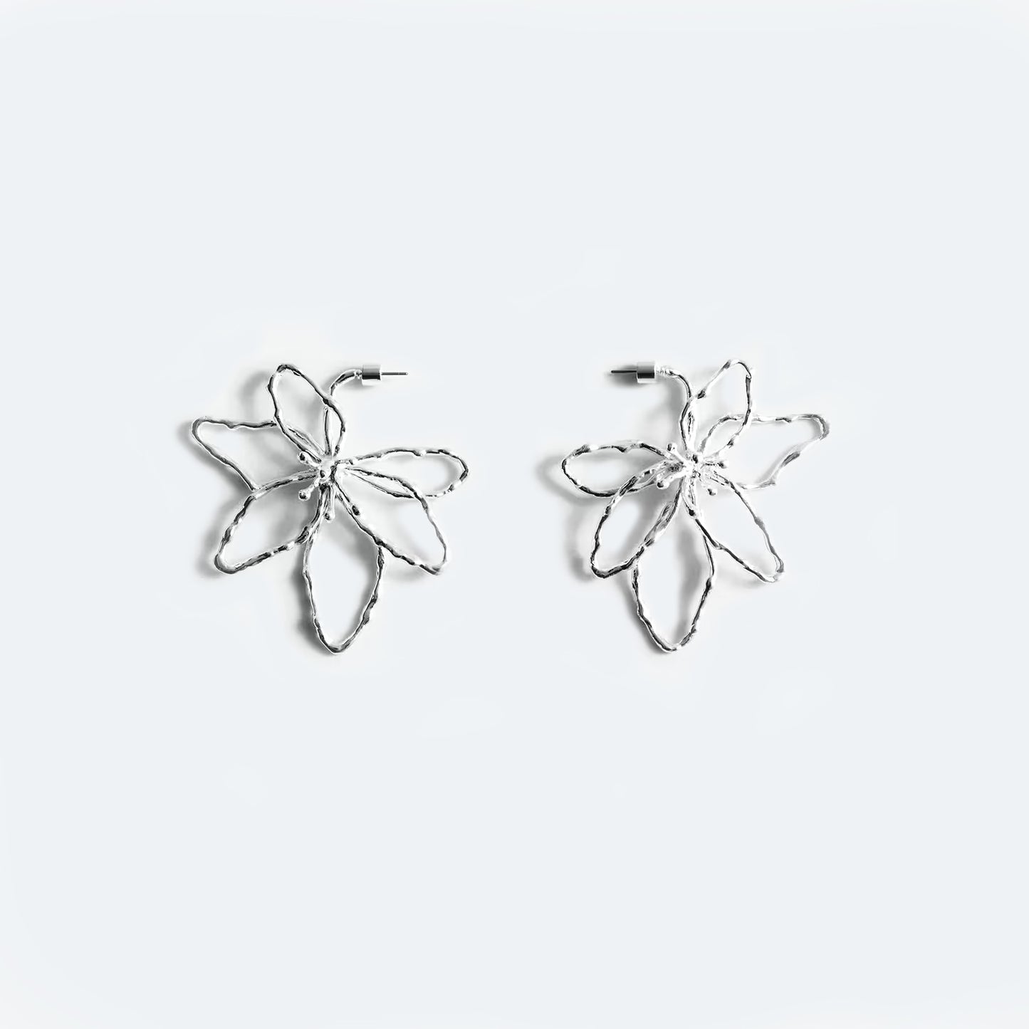 Silver metal flower earring