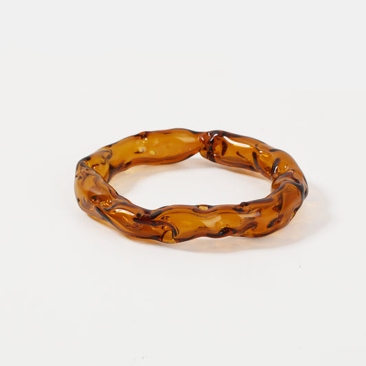 Amber brown molten-textured glass bangle