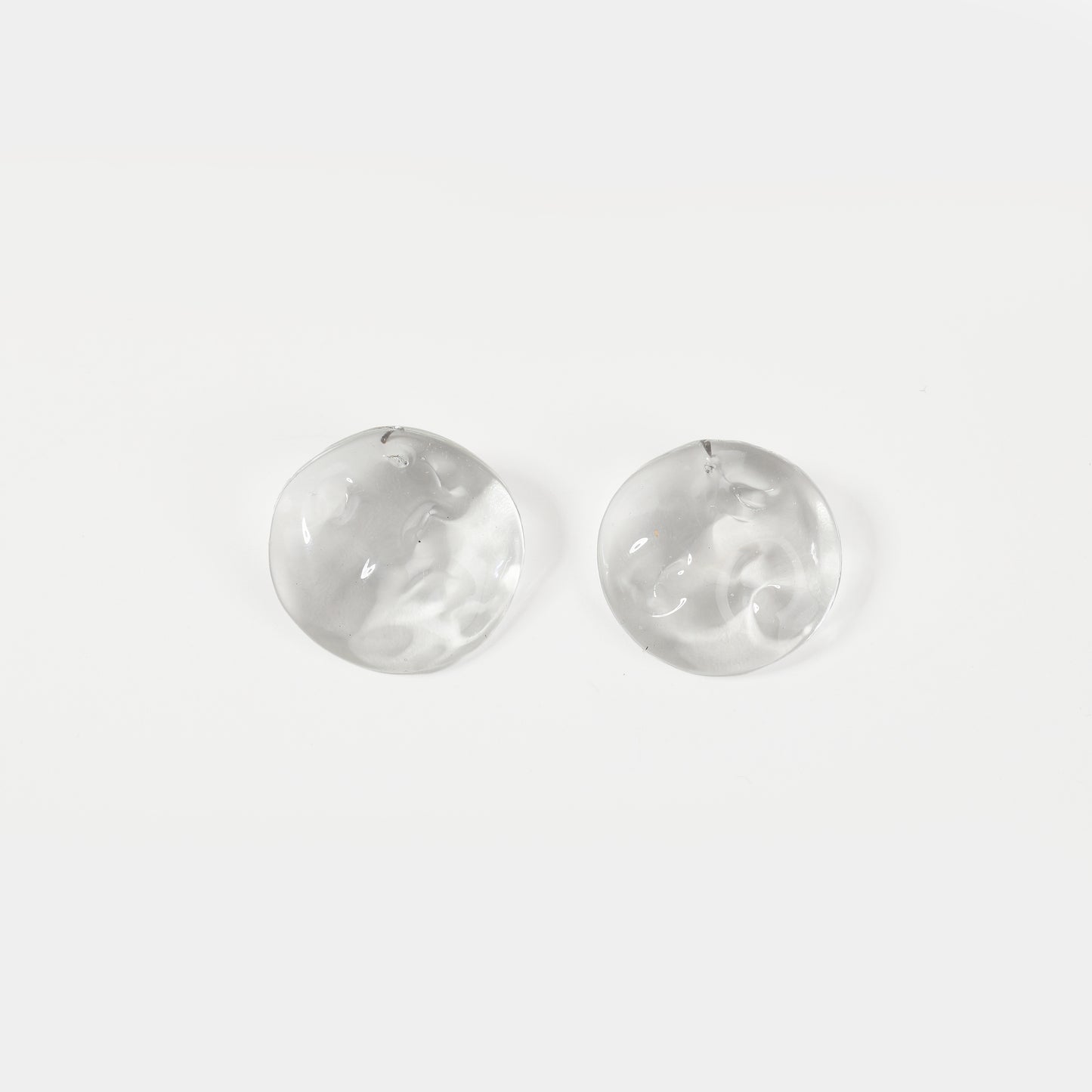 Clear textured disc glass stud earrings