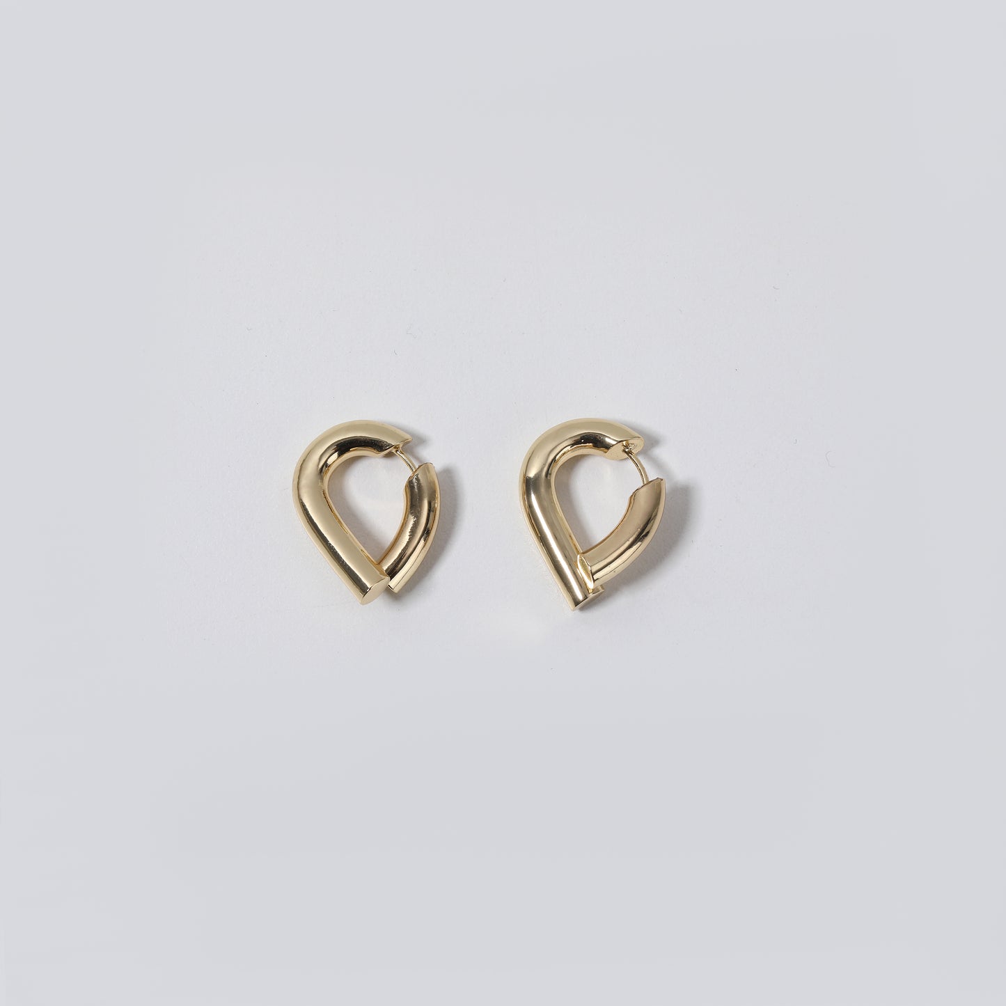 Glossy Gold Metal Teardrop Hoop Earrings