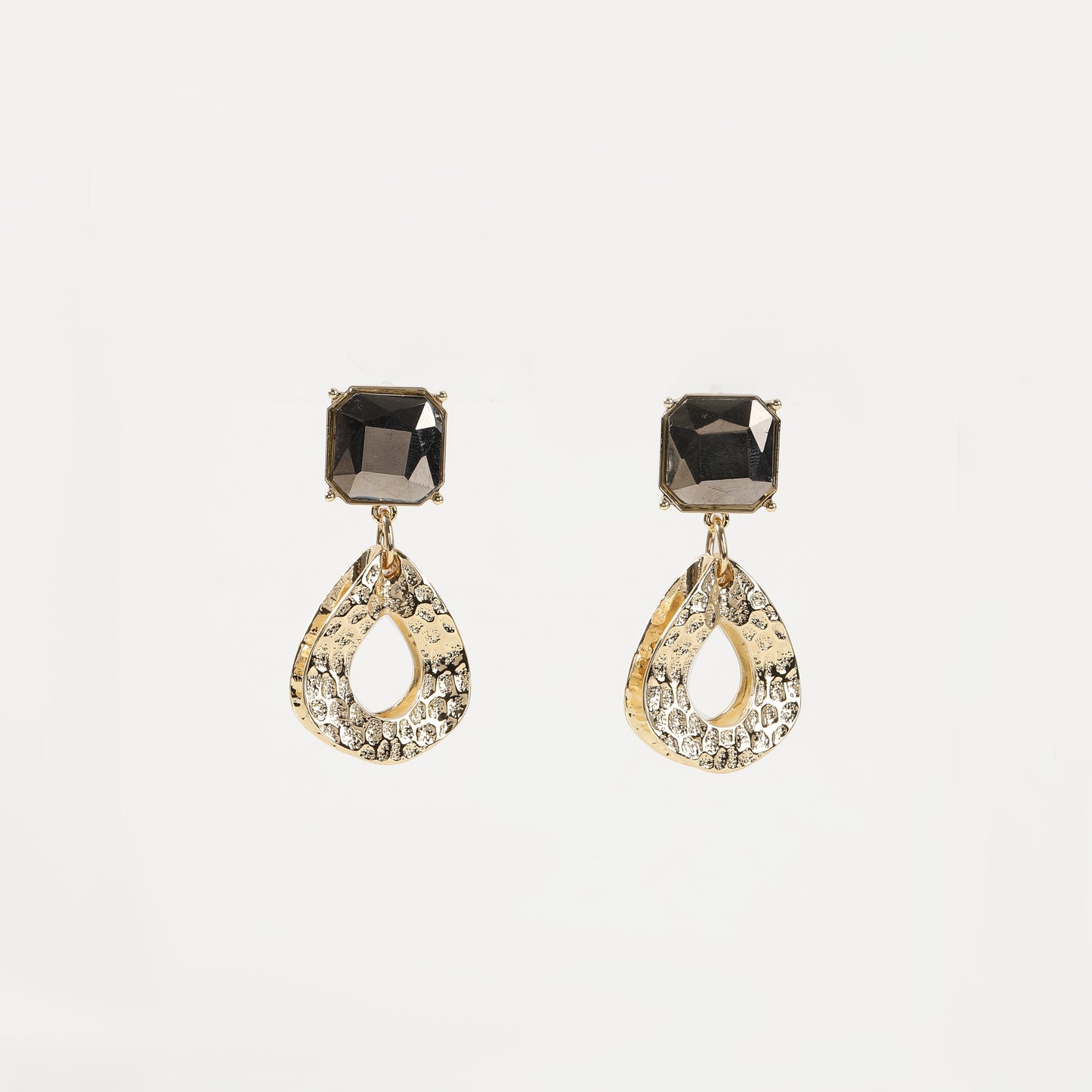 Gold drop earring with black crystal top and textured teardrop charm