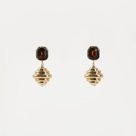 Gold drop earring with brown crystal top and ribbed spiral charm