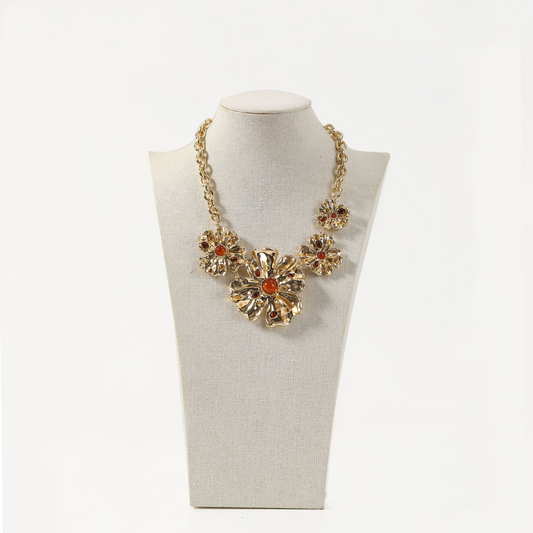 Gold floral statement necklace with orange and brown gemstones