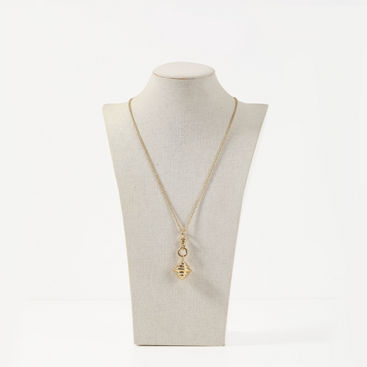Gold necklace with ribbed spiral pendant