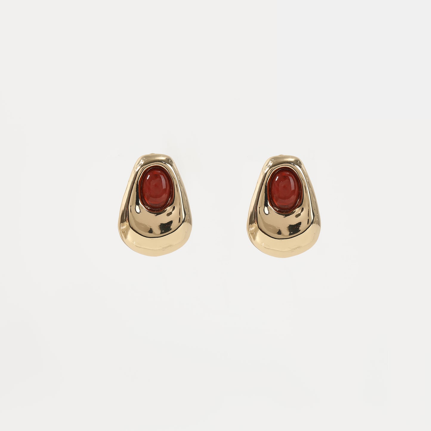Gold organic-shaped stud earring with red agate cabochon