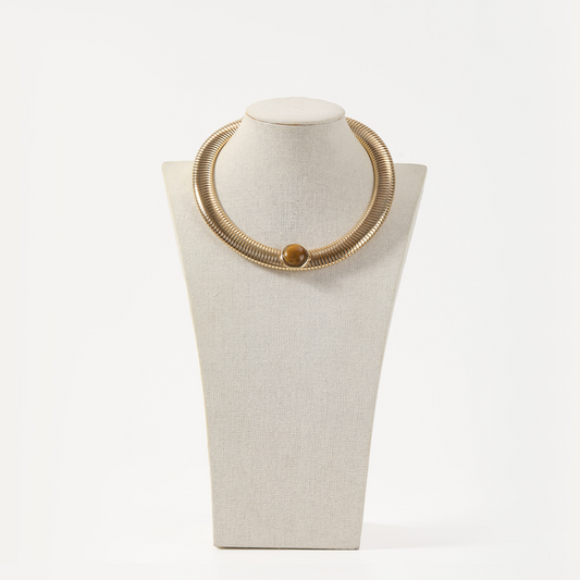 Gold ribbed torque necklace with tiger eye stone