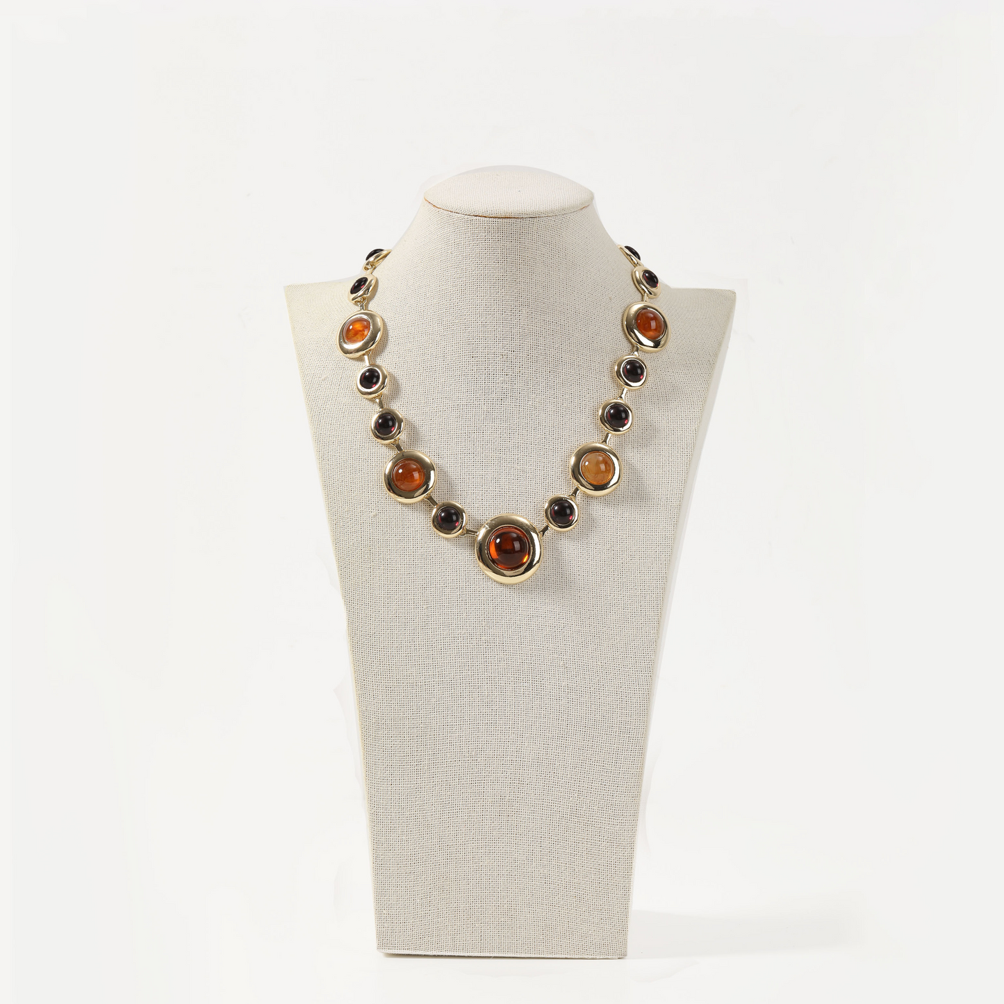 Gold statement necklace with amber-toned round gemstones