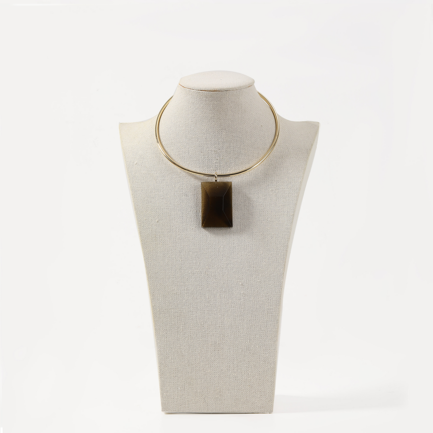 Gold torque necklace with brown tiger's eye rectangular pendant
