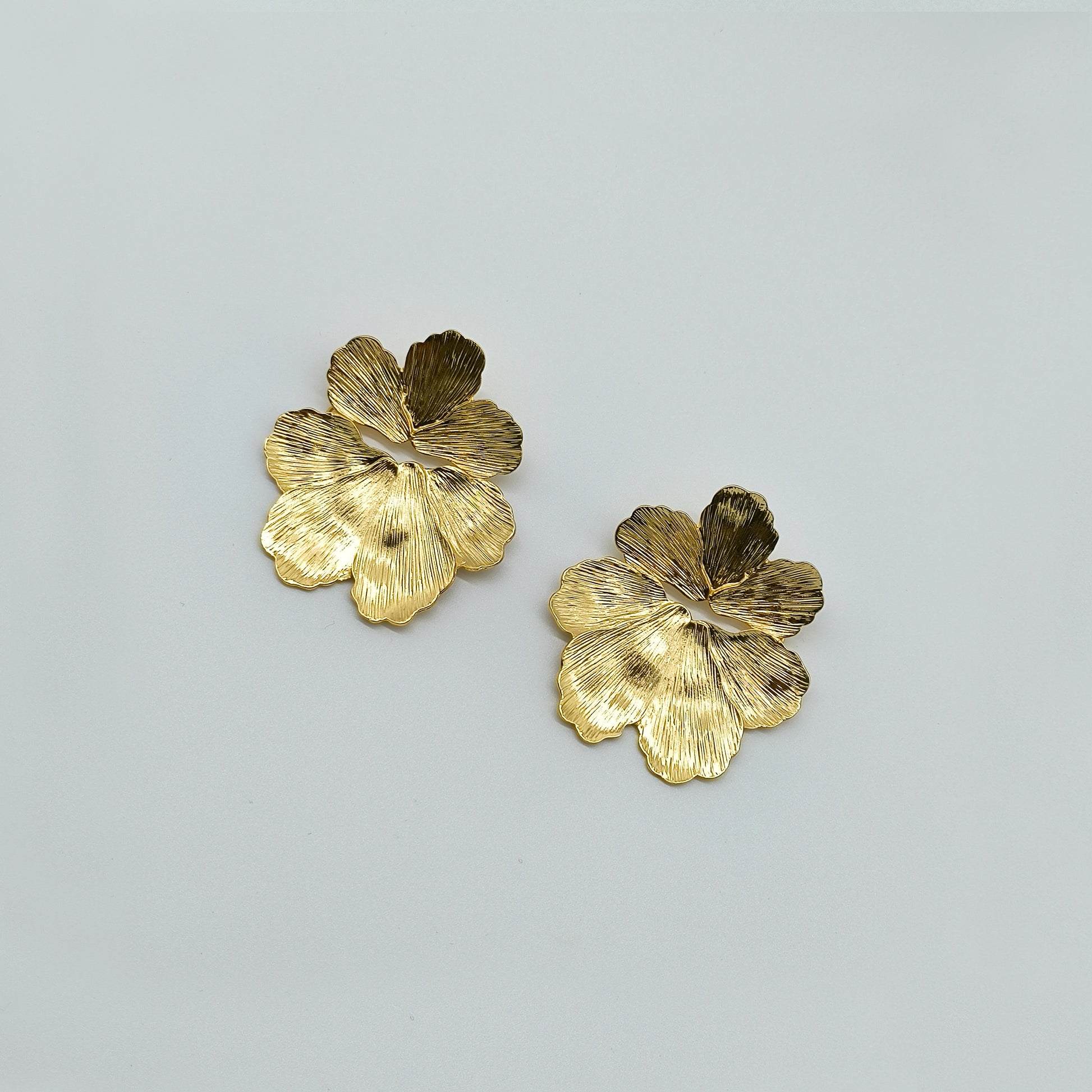 Golden Floral Statement Earrings – Oversized Petal Drop Style