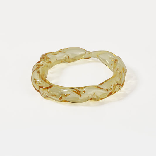 Light yellow molten-textured glass bangle