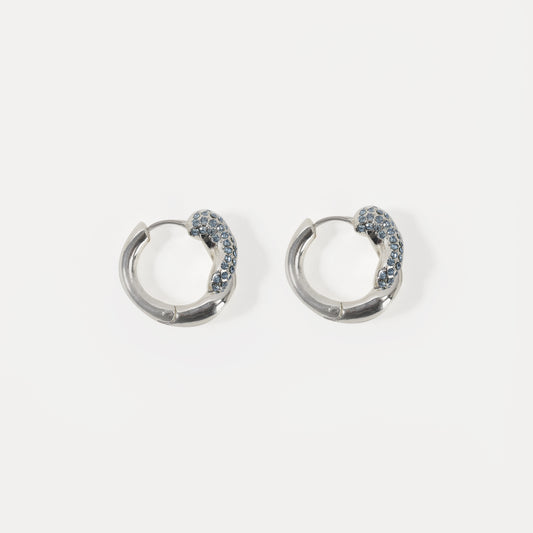 Silver chunky hoop earring with light blue crystal accent