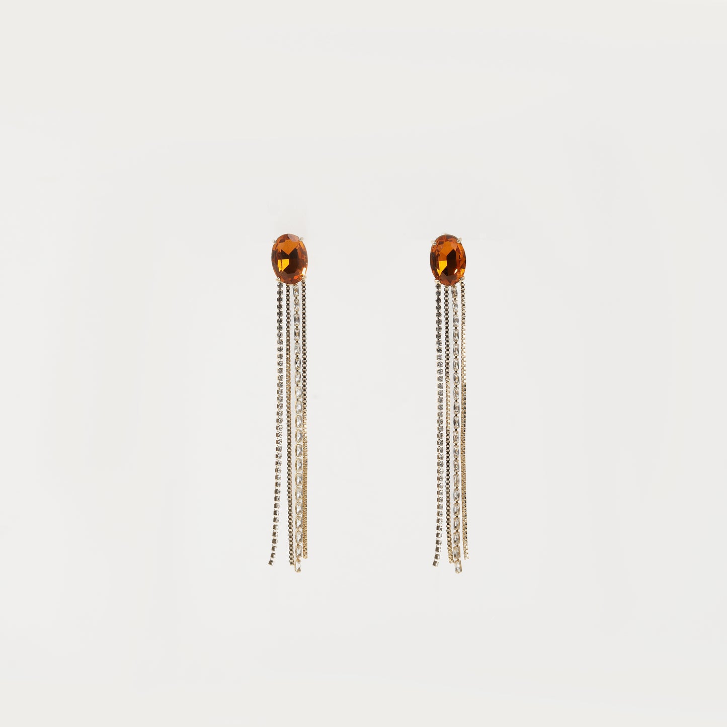 Silver drop earring with orange crystal top and multi-chain tassel