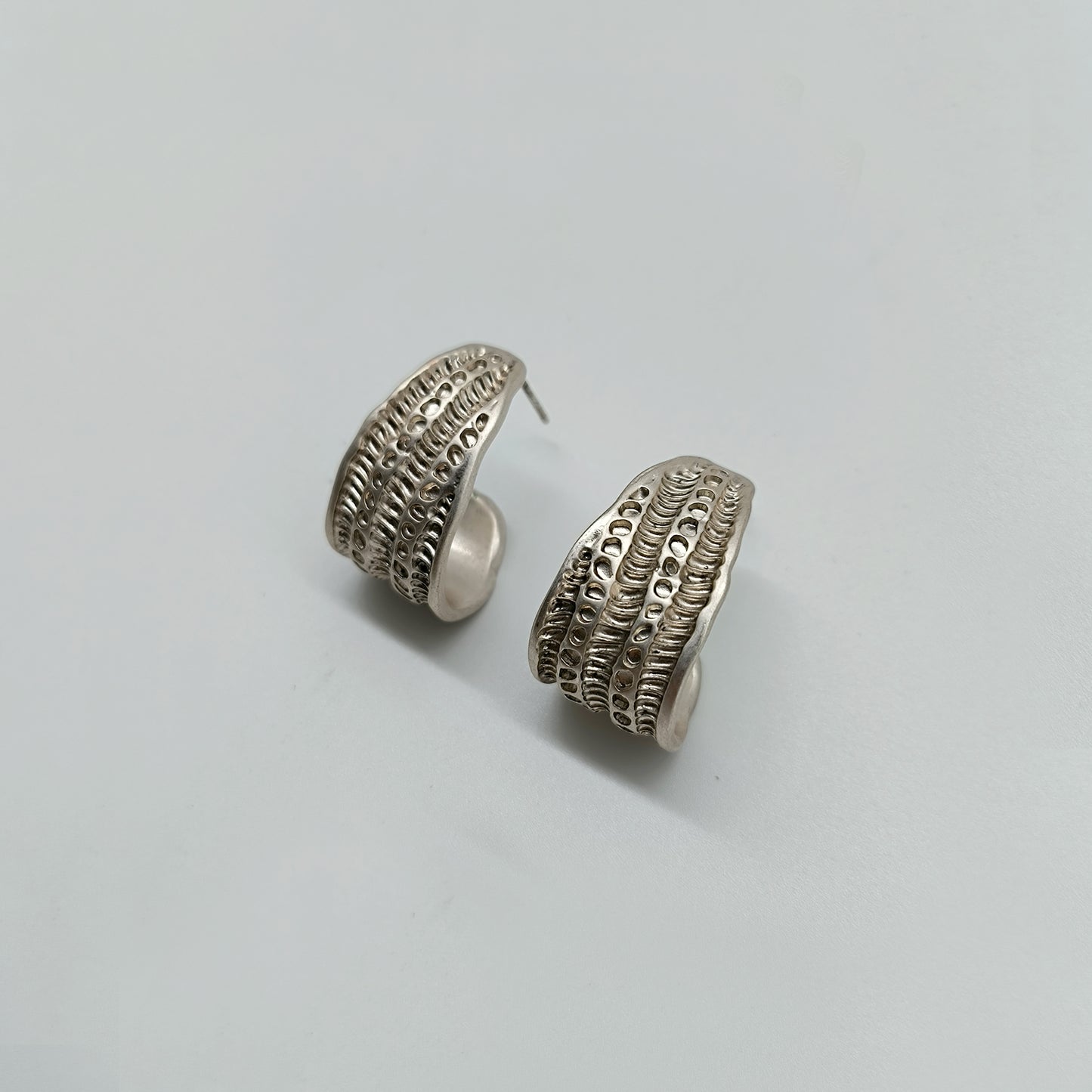 Silver hoop earring
