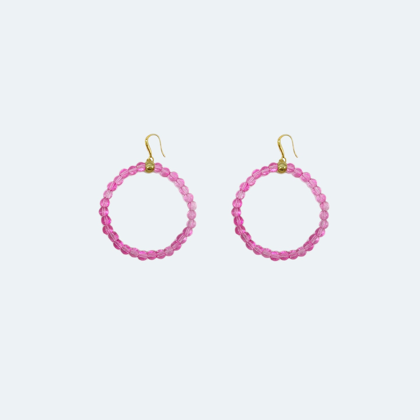 Pink beaded circle earrings